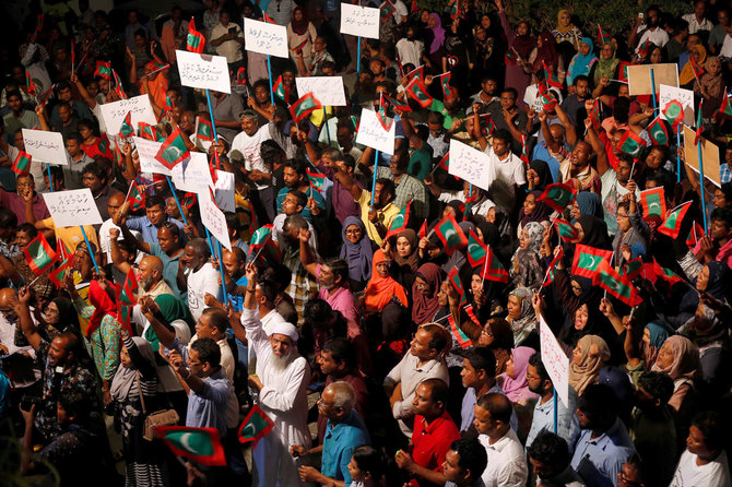 „Reuters“/„Scanpix“ nuotr./Protestuotojai Maldyvuose