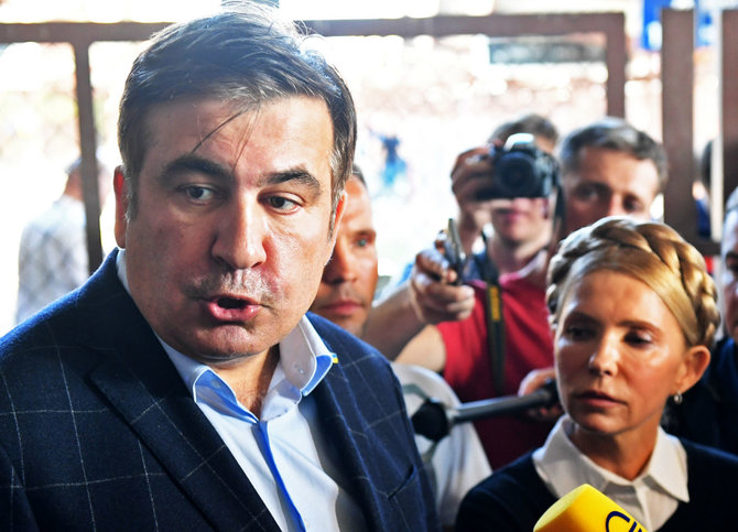 AFP/„Scanpix“ nuotr./Michailas Saakašvilis ir Julija Tymošenko