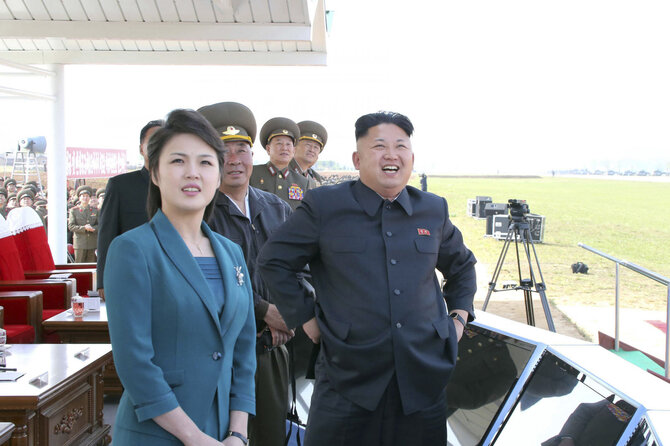 „Reuters“/„Scanpix“ nuotr./Kim Jong Unas ir Ri Sol Ju
