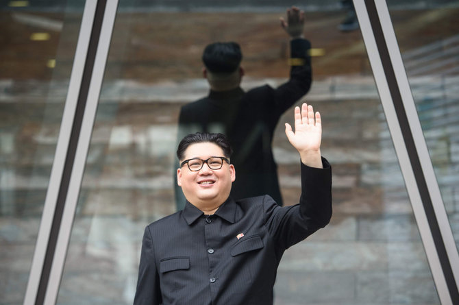 AFP/„Scanpix“ nuotr./Kim Jong Uno antrininkas Honkonge