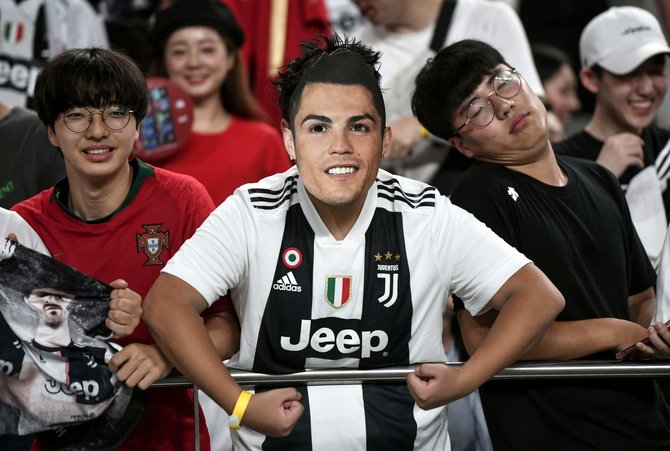 AFP/„Scanpix“ nuotr./Cristiano Ronaldo nežaidė rungtynėse Seule.