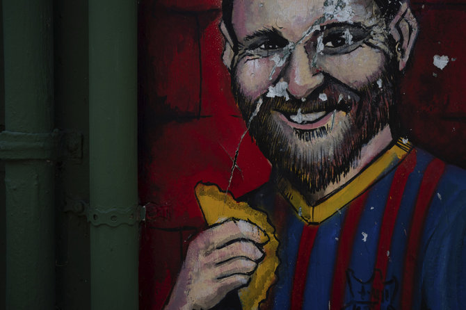 „Scanpix“ nuotr./Lionelis Messi atvaizdas subjaurotas Barselonoje.