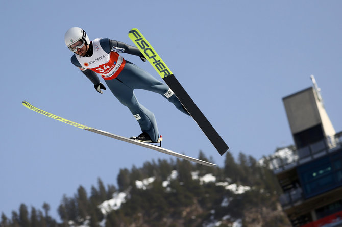 „Scanpix“ nuotr./Vokietijos Alpių miestelyje Oberstdorfe prasidėjo pasaulio slidinėjimo, šuolių nuo tramplino ir Šiaurės dvikovos čempionatas.