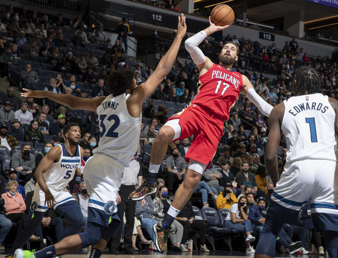 „Scanpix“/AP nuotr./Jonas Valančiūnas pelnė 22 taškus ir atkovojo 23 kamuolius per mačą su „Timberwolves“.