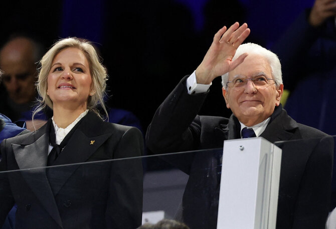 „Scanpix“ nuotr./Olimpinių žaidynių Italijoje atidarymo fiesta. Italijos prezidentas Sergio Mattarella ir IOC prezidentė Kirsty Coventry.