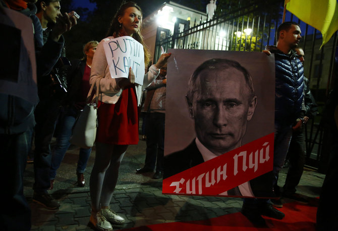 „Reuters“/„Scanpix“ nuotr./Protestas Vladimiro Putino gimimo dieną