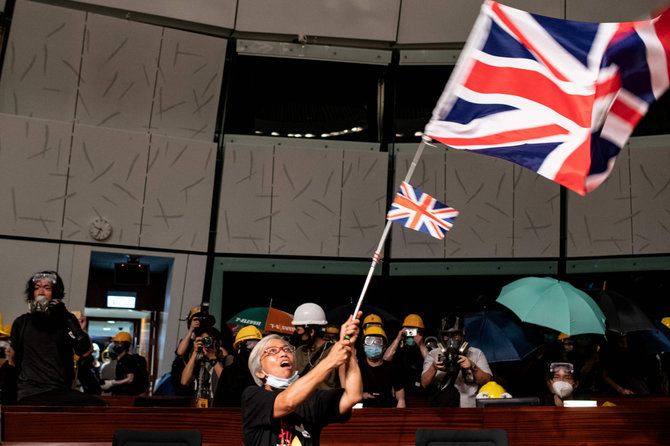 AFP/„Scanpix“ nuotr./Honkongo protestuotojai