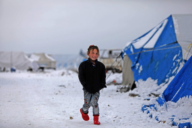 AFP/„Scanpix“ nuotr./Pabėgėlių stovykla netoli sienos su Turkija