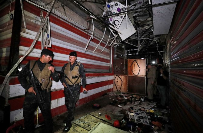 AFP/„Scanpix“ nuotr./Irako pajėgos išpuolio vietoje