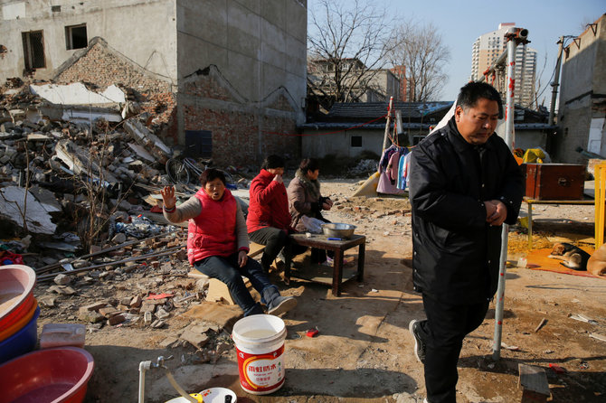 „Reuters“/„Scanpix“ nuotr./Gaisro nusiaubtas Pekino rajonas