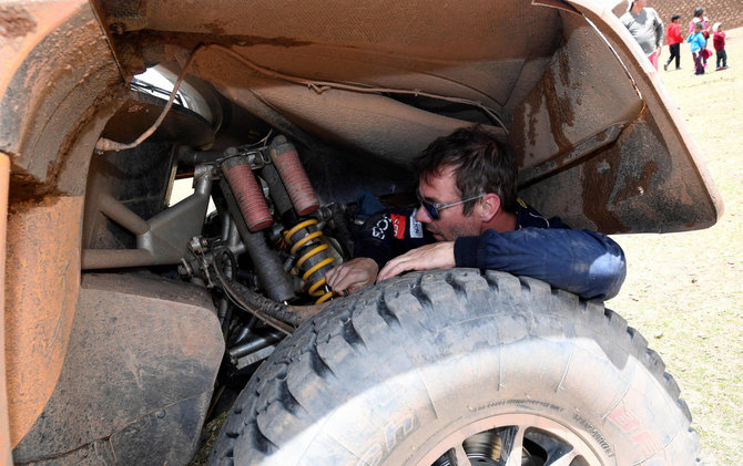 AFP/„Scanpix“ nuotr./Sebastianas Loebas, „Peugeot“ komandos vairuotojas