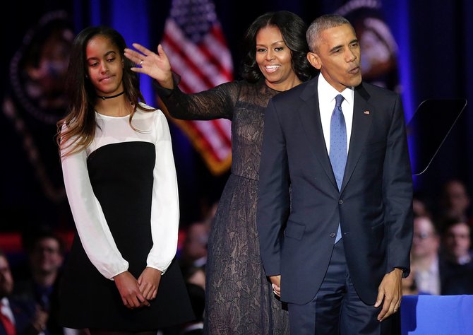 AFP/„Scanpix“ nuotr./Michelle ir Barackas Obamos su dukra