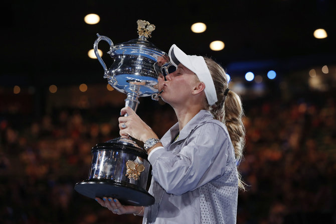 „Reuters“/„Scanpix“ nuotr./Sausį C.Wozniacki laimėjo pirmą „Didžiojo kirčio“ titulą karjeroje