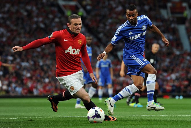 AFP/„Scanpix“ nuotr./Ashley Cole'as prieš Wayne'ą Rooney 2013 metais