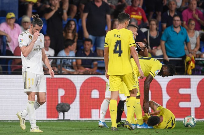 AFP/„Scanpix“ nuotr./Garethas Bale'as ir „Villarreal“ futbolininkai