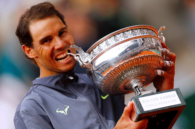 „Reuters“/„Scanpix“ nuotr./Rafaelis Nadalis su „Roland Garros“ titulu