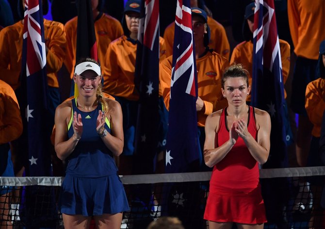 AFP/„Scanpix“ nuotr./Caroline Wozniacki ir Simona Halep