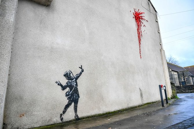 „Scanpix“ nuotr./Banksy kūrinys ant pastato Vakarų Anglijoje