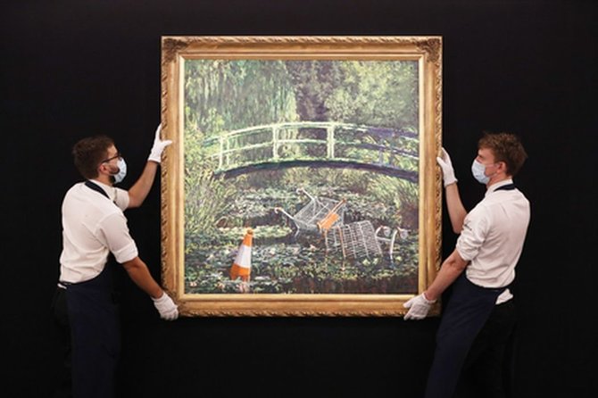 „Scanpix“ nuotr./Banksy kūrinys „Parodyk man Monet“ 