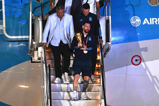 AFP/„Scanpix“ nuotr./Pasaulio čempionė Argentinos rinktinė grįžo namo