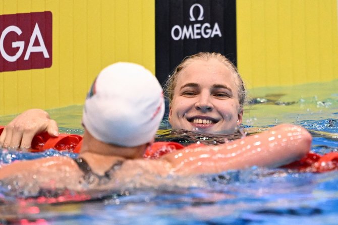 AFP/„Scanpix“ nuotr./Rūta Meilutytė iškovojo pasaulio čempionato auksą ir pagerino planetos rekordą