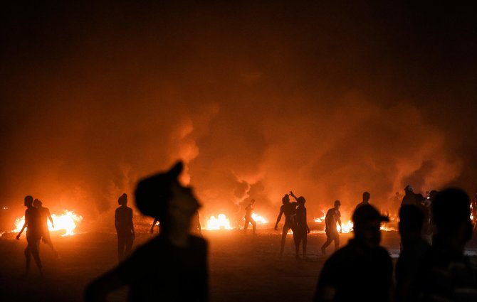 AFP/„Scanpix“ nuotr./Palestiniečių protestuotojai