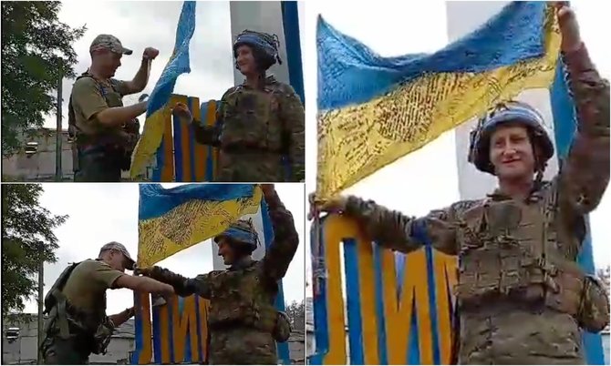 Kadrai iš vaizdo įrašo/Ukrainos pajėgos prie įvažiavimo į Lymaną iškėlė Ukrainos vėliavą