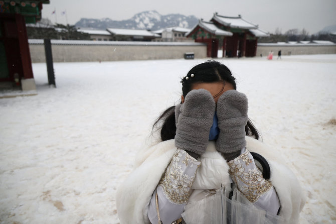 „Reuters“/„Scanpix“ nuotr./Šalti orai Pietų Korėjoje