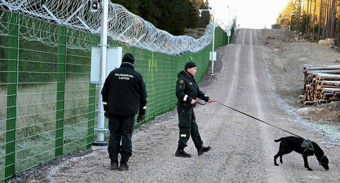 AFP-Scanpix nuotr./ Suomijos ir Rusijos pasienis