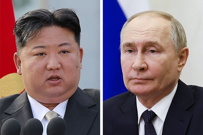 „AFP“/„Scanpix“/Šiaurės Korėjos vadovas Kim Jong Unas ir Rusijos prezidentas Vladimiras Putinas