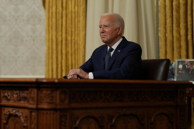 JAV prezidentas Joe Bidenas kalba iš Ovalinio kabineto. / Erin Schaff / via REUTERS