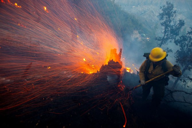 „Reuters“/„Scanpix“/Gaisrai Los Andžele