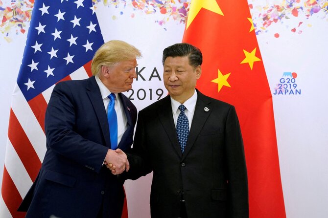 D. Trumpas su Xi Jinpingu / Kevin Lamarque / REUTERS