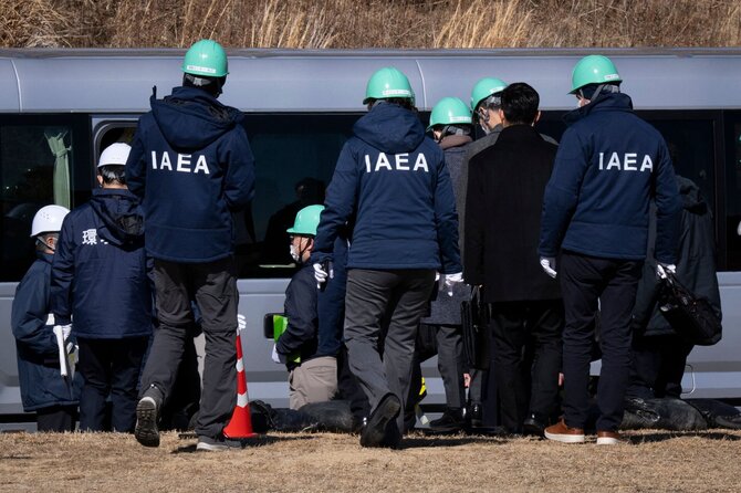 TATENA darbuotojai / YUICHI YAMAZAKI / AFP