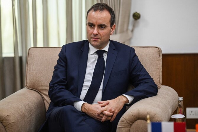 Prancūzų gynybos ministras Sebastienas Lecornu / MONEY SHARMA / AFP