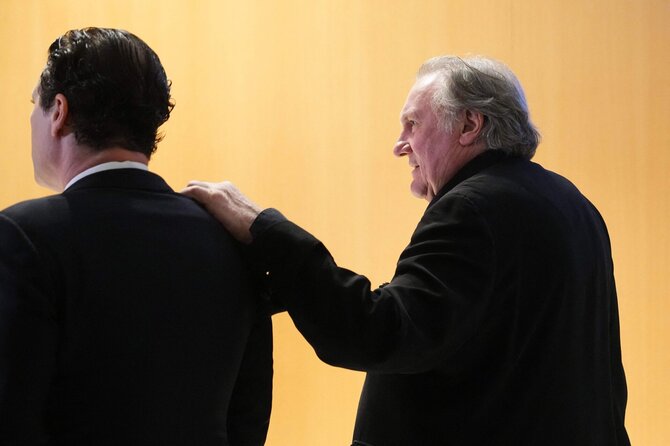 Gerard'as Depardieu su advokatu / DIMITAR DILKOFF / AFP