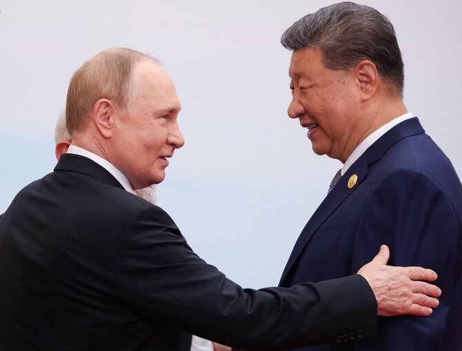 Vladimiras Putinas su Kinijos prezidentu / IMAGO/Alexander Kazakov / IMAGO/SNA