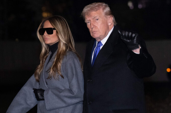 Donaldas Trumpas su pirmąja JAV ponia Melania / SAUL LOEB / AFP