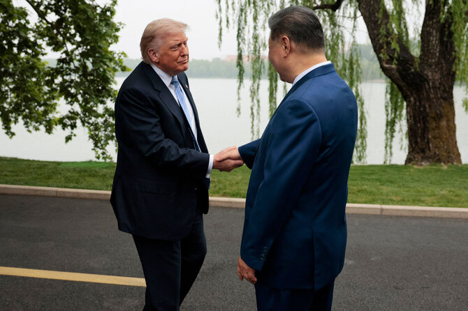 Donaldas Trumpas ir Xi Jinpingas / EVAN VUCCI / AFP