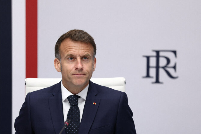 E. Macronas / TOM NICHOLSON / AFP