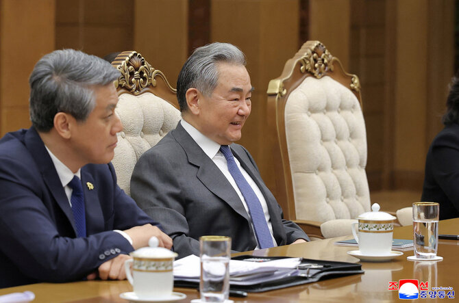 Wang Yi / KCNA / via REUTERS