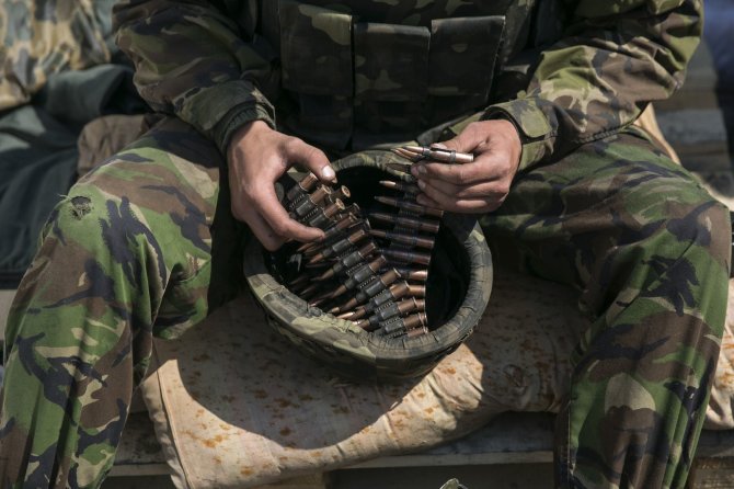 „Reuters“/„Scanpix“ nuotr./Ukrainos karys netoli Slovjansko miesto