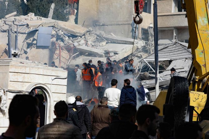 AFP/„Scanpix“ nuotr./Izraelis smūgiavo į gyvenamąjį pastatą Sirijos sostinėje