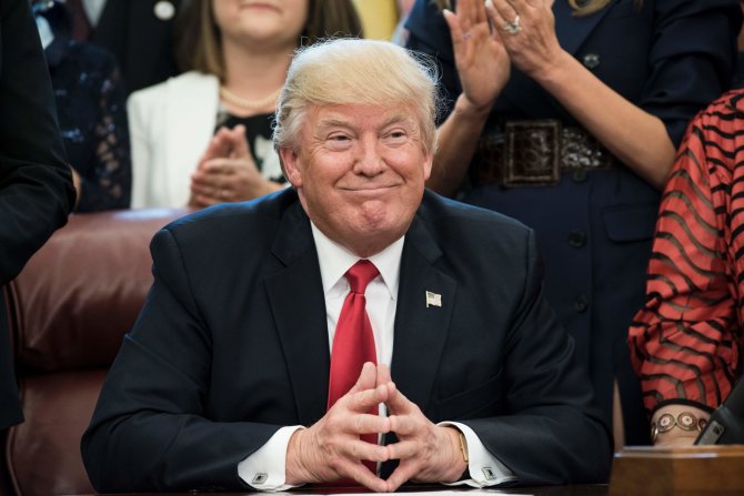 AFP/„Scanpix“ nuotr./Ką per 100 dienų nuveikė naujasis JAV prezidentas Donaldas Trumpas?