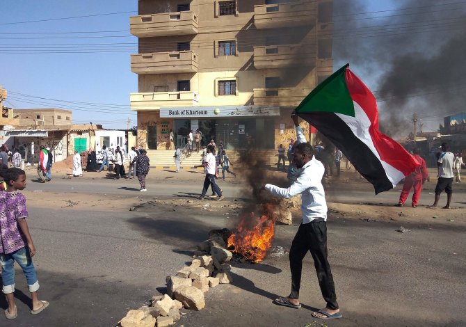 AFP/„Scanpix“ nuotr./Protestuotojai Sudane