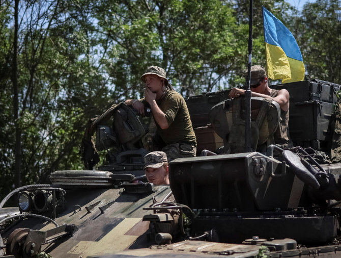 „Reuters“/„Scanpix“ nuotr./Ukrainos kariai netoli fronto linijos