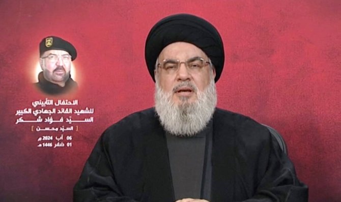 Hezbollah lyderis Sayyed Hassan Nasrallah kalba per televiziją. / Al-Manar TV / via REUTERS