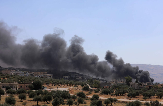 AFP/„Scanpix“ nuotr./Gyvenvietė Idlibe po Rusijos aviacijos smūgių