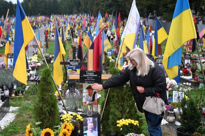 AFP/„Scanpix“ nuotr./Ukrainos karių kapai