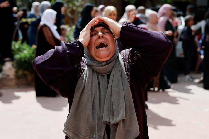 „Reuters“/„Scanpix“/Moteris Gazos Ruože